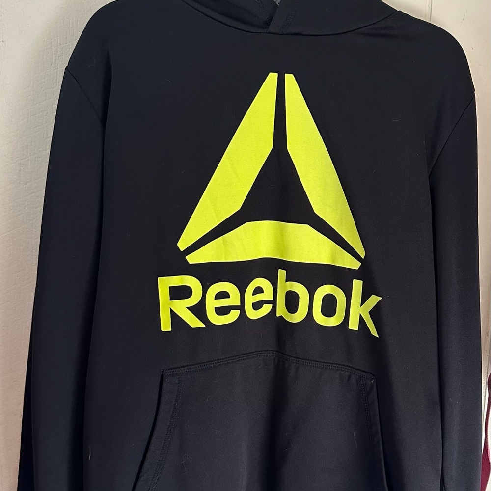 Reebok Black Sweatshirt with Vibrant Yellow Emblem